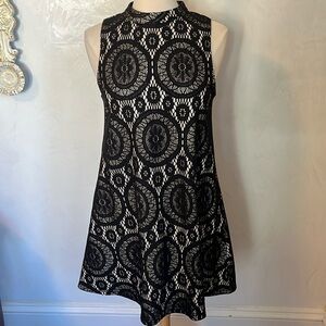 Love fire Black Crochet Dress w/Gold sparkle lining & Medallion detail Size M